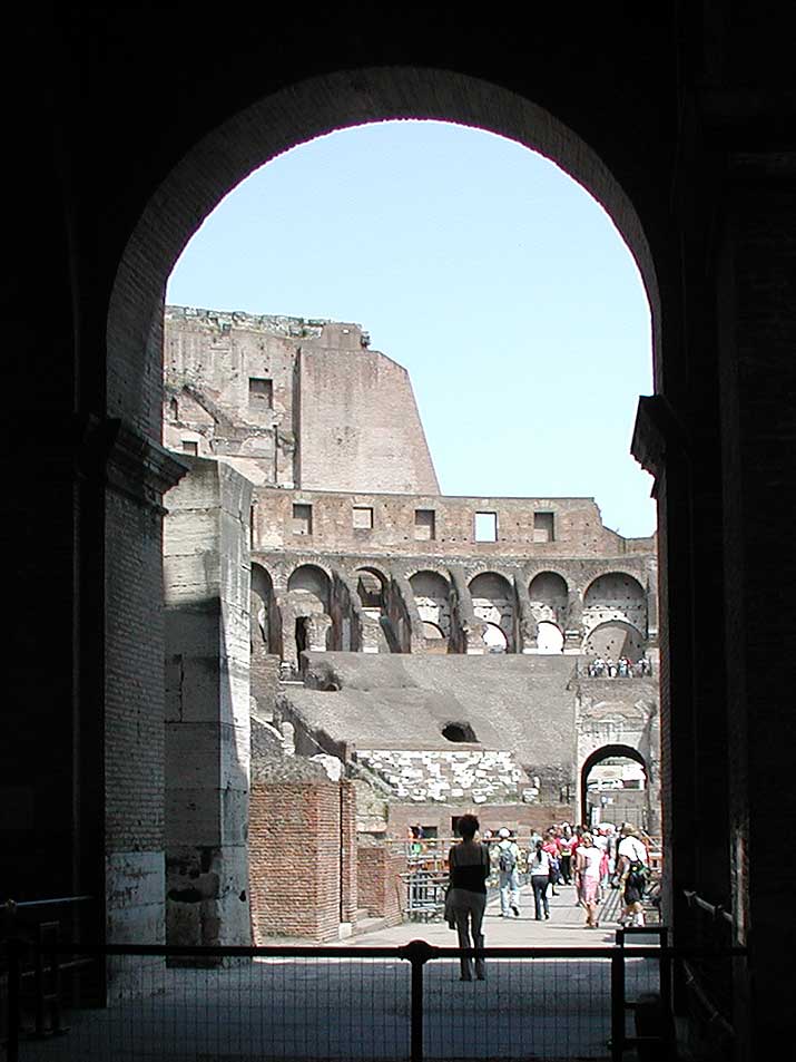 Looking through an arch into the Colosseum